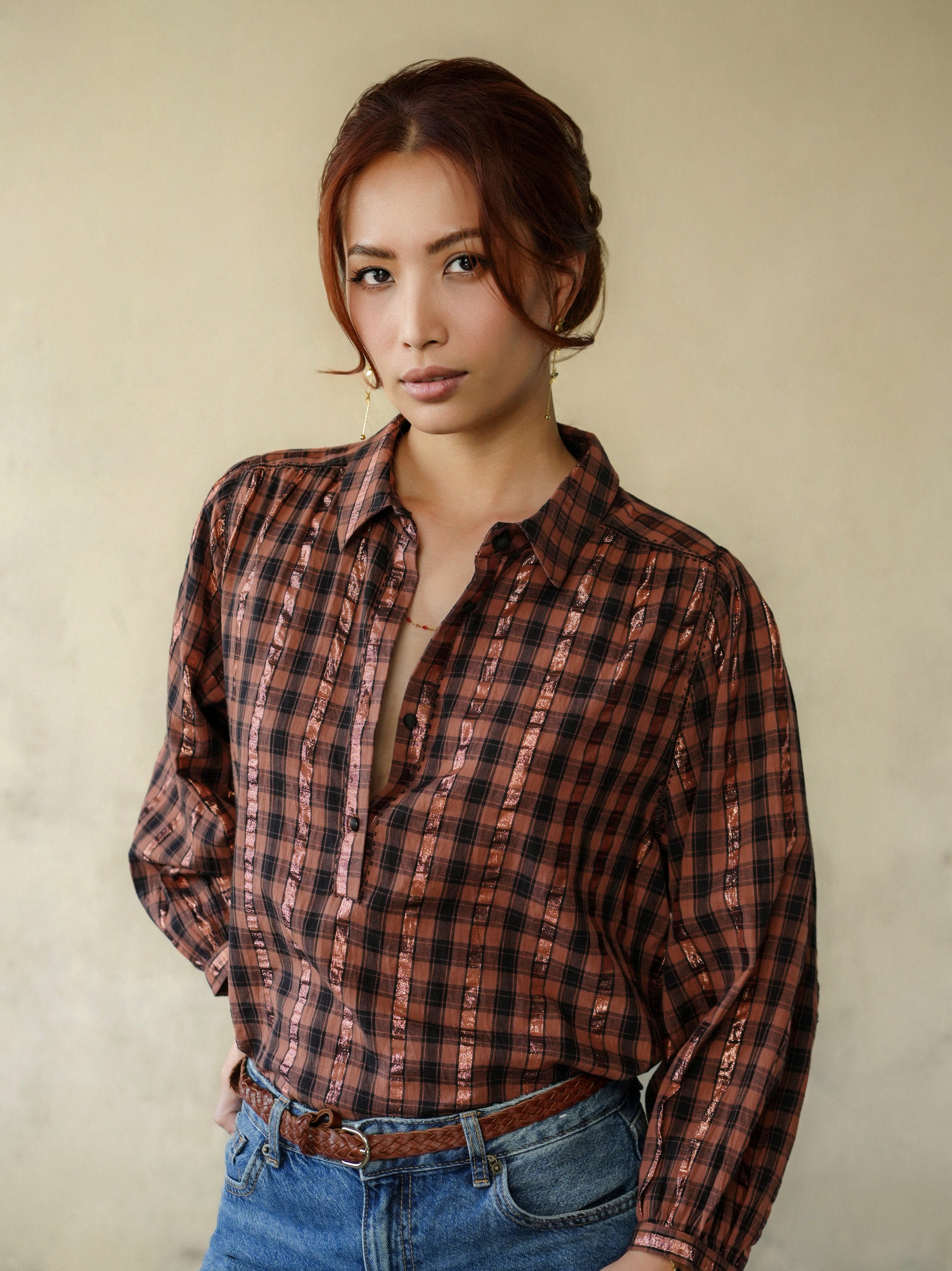 woman wearing birkin blouse rust