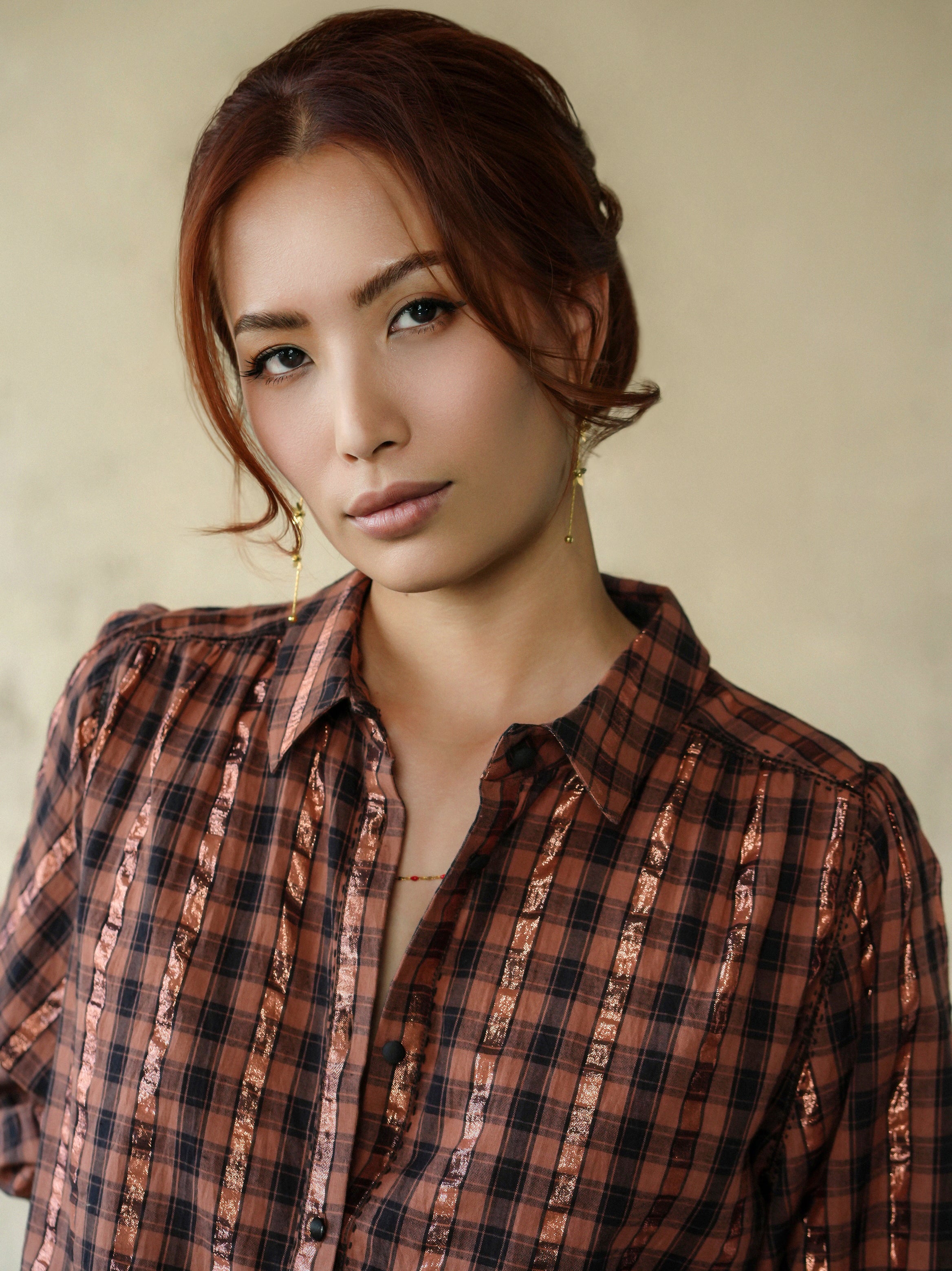 woman wearing birkin blouse rust